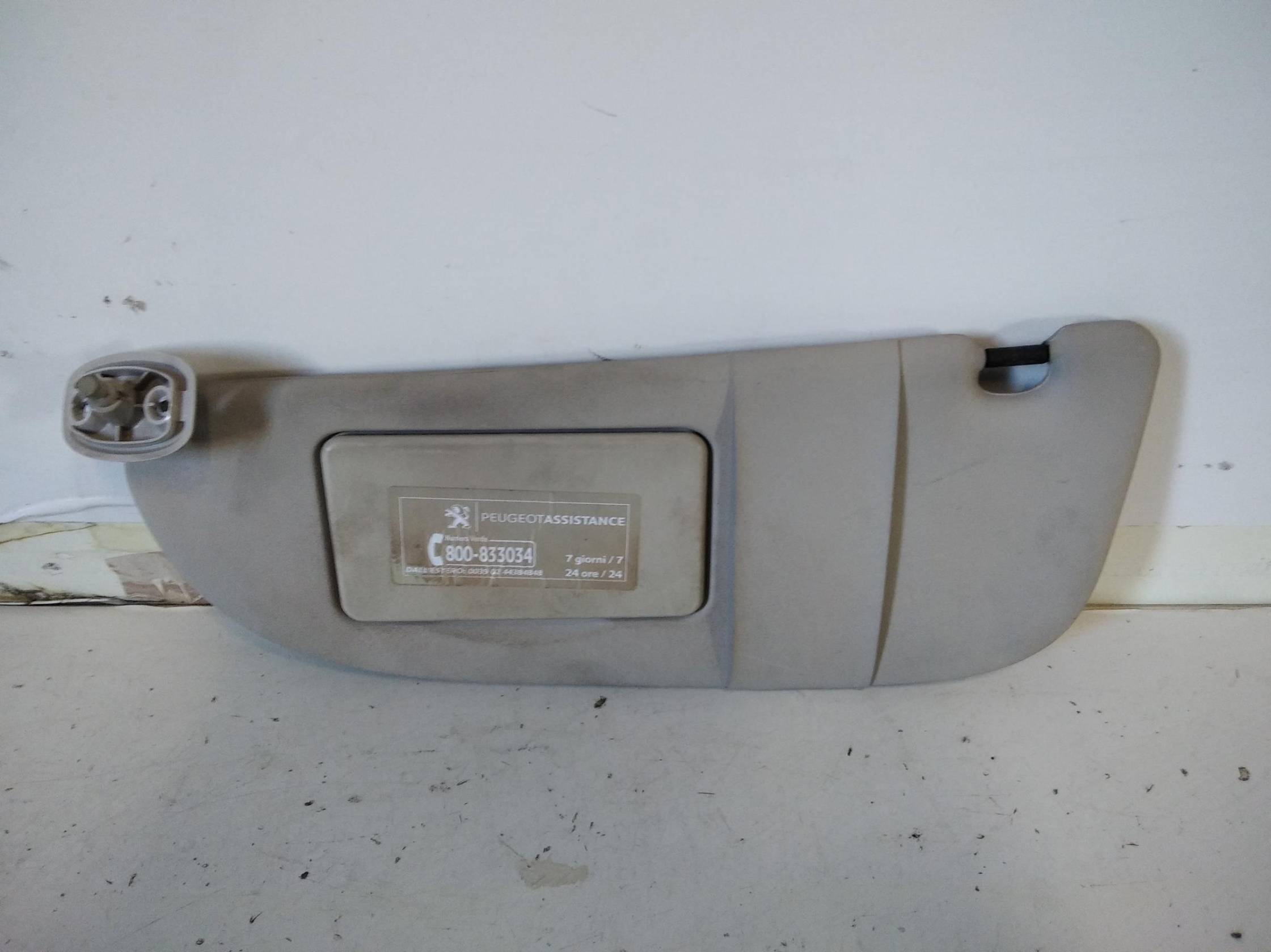 Aletta parasole parabrezza sx.